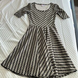 Hilario’s size Small Nichole a line dress in metallic gold and black